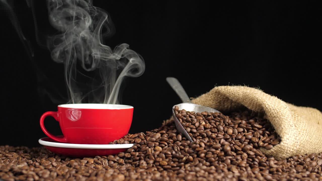 Cup Of Fresh Coffee And Sack With Beans, Slow Motion