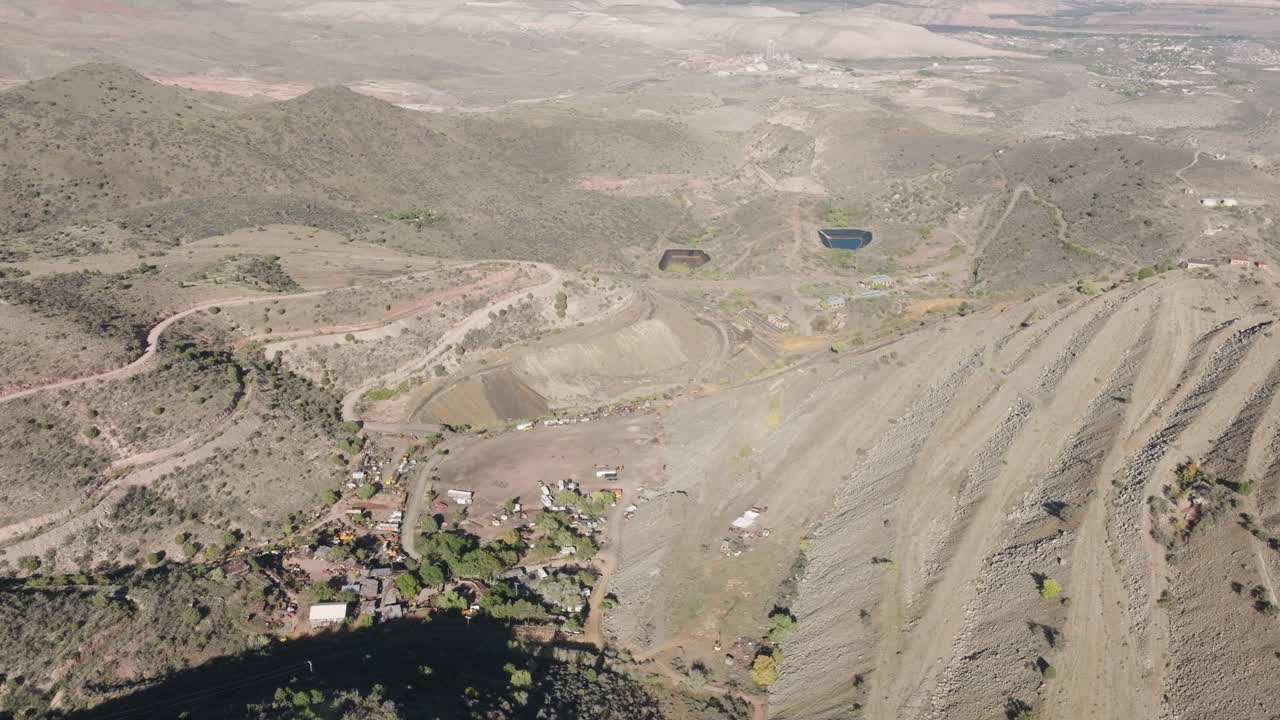 Aerial Drone High Angle View of Historic Copper Mine Terraces and Residential Homes in the Mining Town of Jerome Arizona