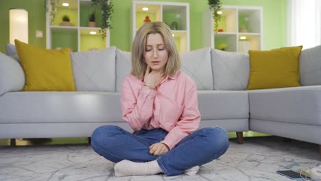 Unhappy-young-woman-looking-at-camera.