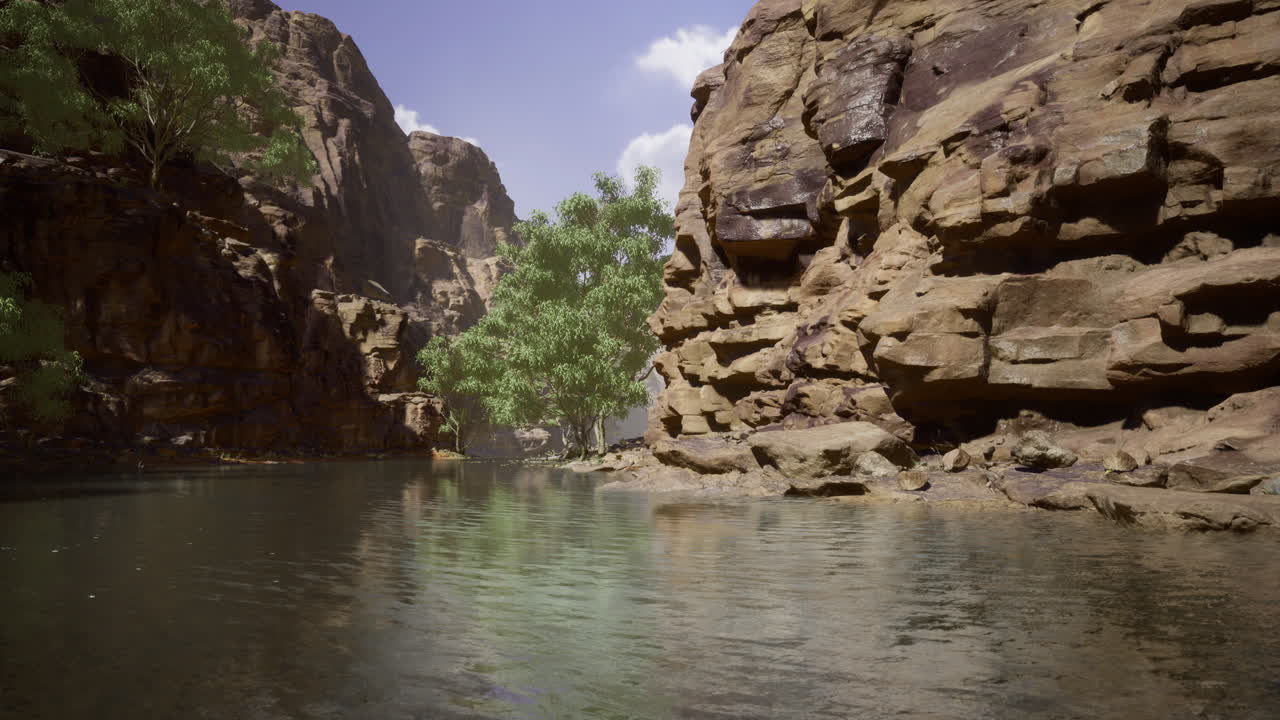 Winding river flows through majestic rocky cliffs under a bright sky