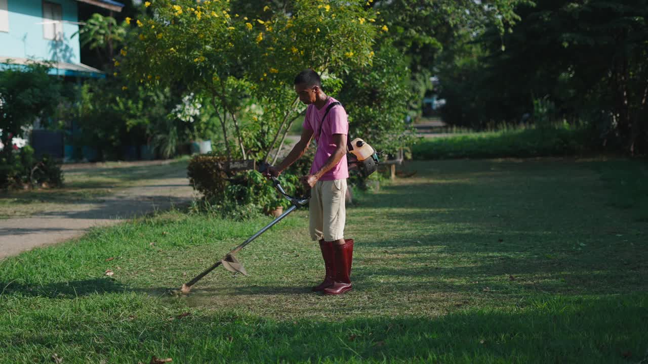 Man Mowing Lawn