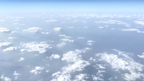 Indian-sky-with-clouds-seen-through-a-window-plane