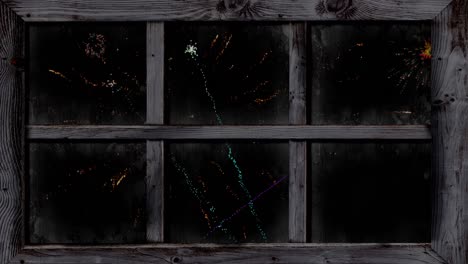 animation of window with colourful christmas and new year fireworks exploding on black background