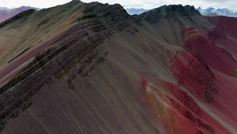 aerial fly drone view of rainbow mountain , vinicunca, cusco region, peru