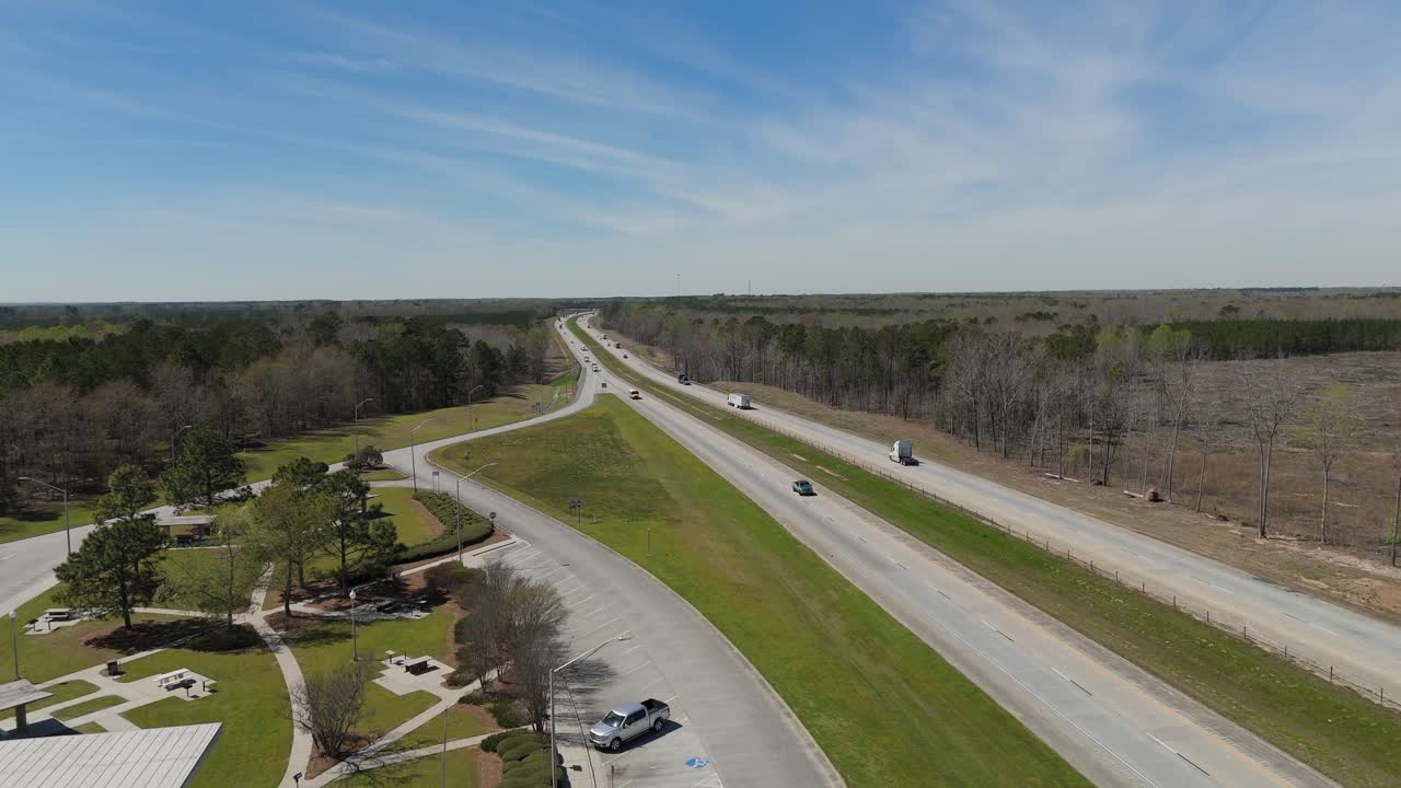 Static aerial shot of of a rest stop along Interstate 16 in Georgia.