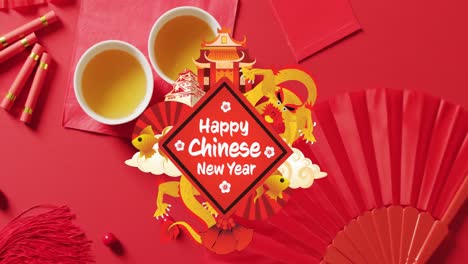 animation of new year greetings text over chinese traditional decorations on red background