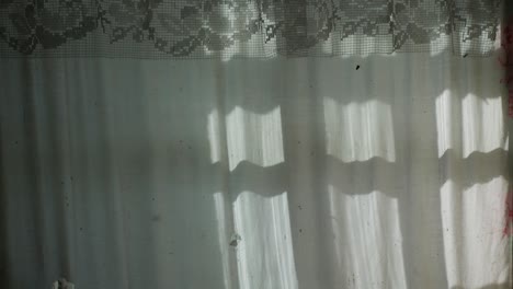 window shadow on an old curtain. time lapse