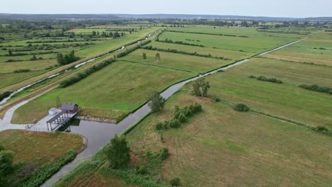 orbit around rivers and a building in polish nature reserve "beka"
