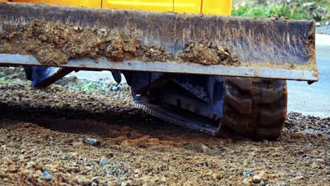 excavator moving on soil