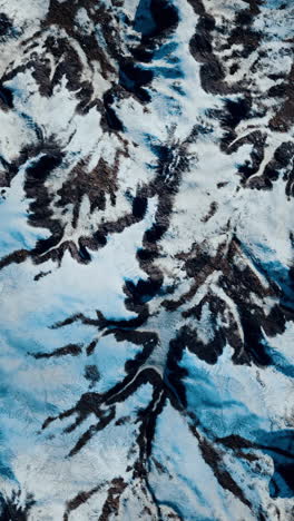 aerial view of snow covered mountains