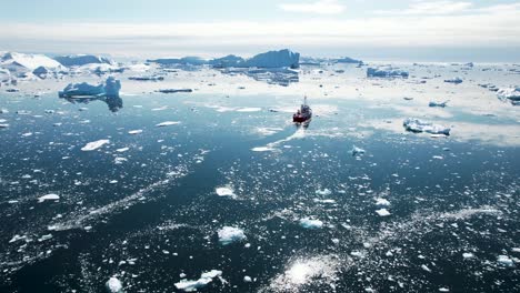 Ship-is-sailing-in-Icefjord,-Greenland