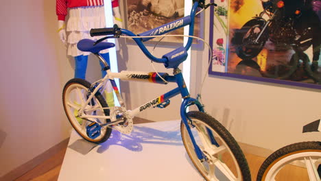 eighties bmx bike on display in a museum. a raleigh burner bicycle from the 1980s