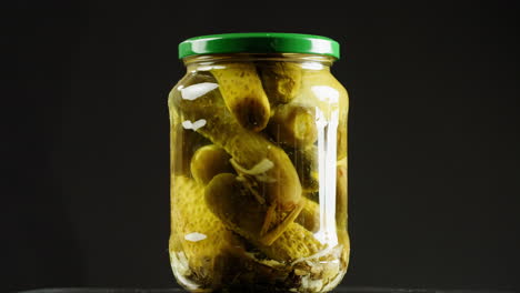 pickled cucumbers in a glass jar