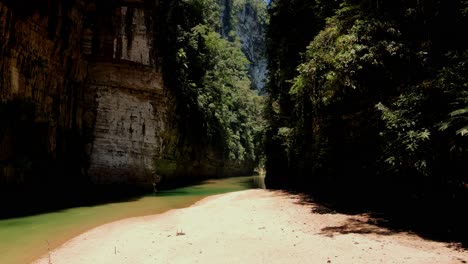 Arco-del-Tiempo,-Chiapas,-Mexico,-Sone-Arch,-River-in-Canyon,-Cave,-Drone-Shot