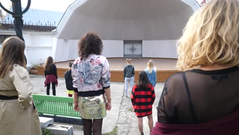 teenage girls performing dance routine outdoors