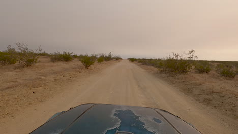Car-driving-along-a-Mojave-Desert-off-road-trail---hyperlapse-point-of-view