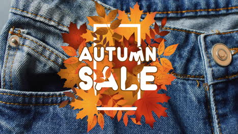 animation of autumn sale text over denim trousers background