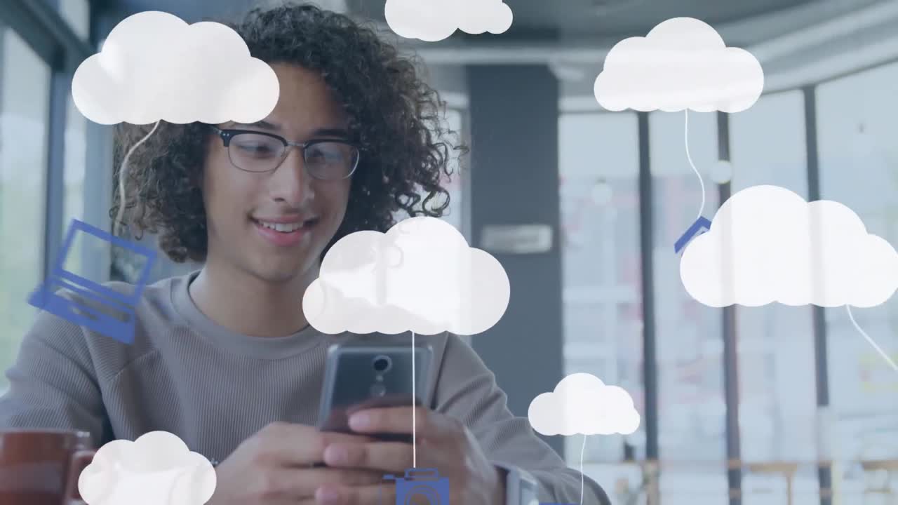 Animation of clouds and digital icons over man using smartphone