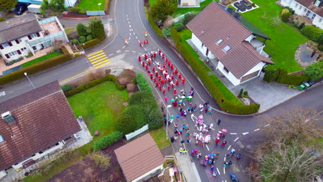 Aerial-of-Neighborhood-Children's-Carnival,-Bergdietikon,-Switzerland