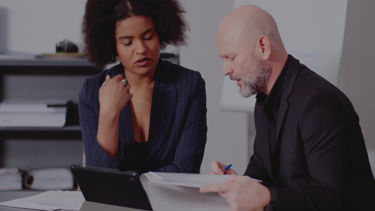 Business meeting with diverse colleagues in office