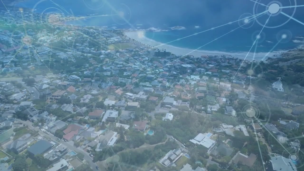 Aerial View of Coastal Residential Area with Digital Network Overlay