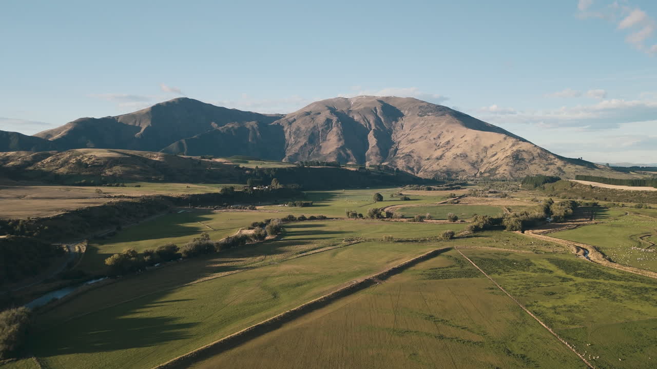Aerial View of Scenic Rural Valley with Mountains