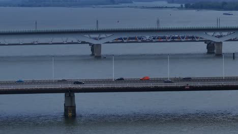 train and traffic on moerdijkbrug spanning the hollands diep river in netherlands