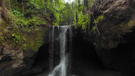 suwat waterfall in bali, shot by a drone to capture the mesmerizing beauty of nature