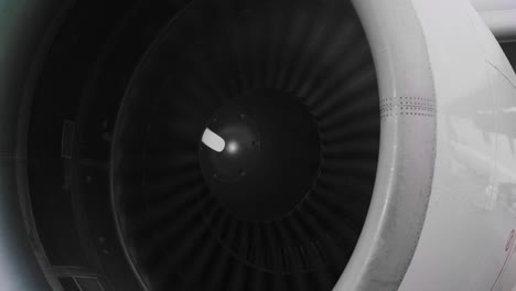 airplane jet engine and landing gears moving forward.
