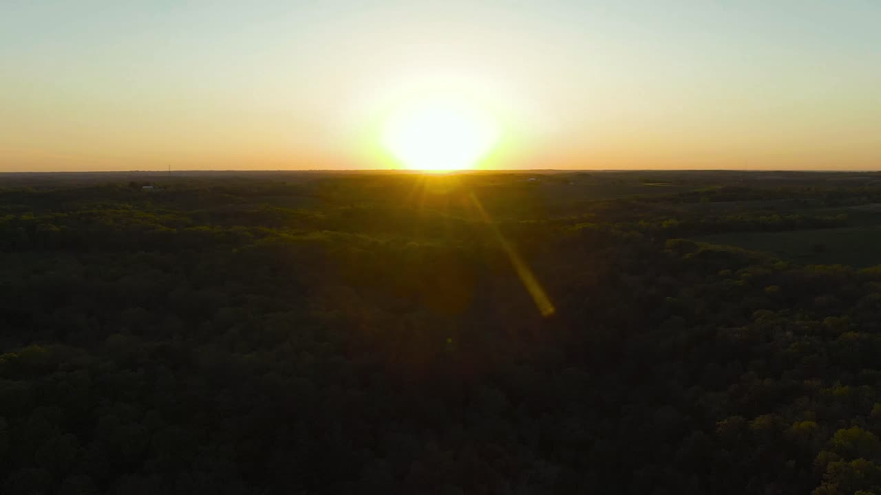 Aerial shot of a late sunset over the hills and mountains of Wisconsin, USA