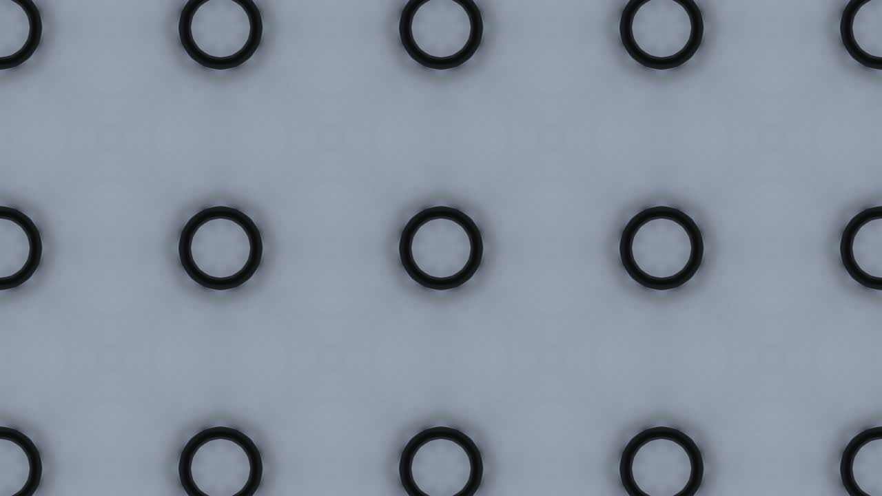 Abstract mosaic animation on a grey background. Seamless loop motion graphic with symmetrical pattern