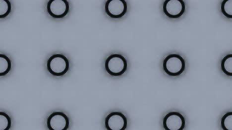 abstract mosaic animation on a grey background. seamless loop motion graphic with symmetrical pattern