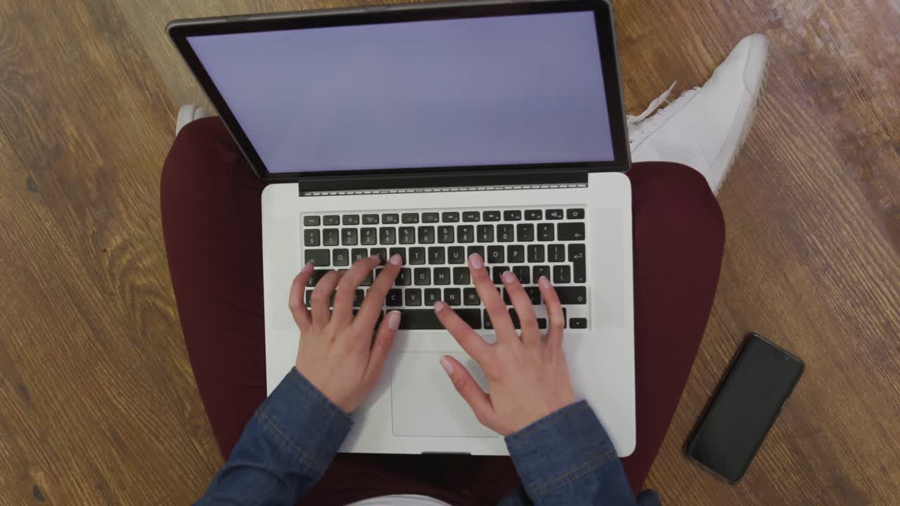 Caucasian woman using a laptop