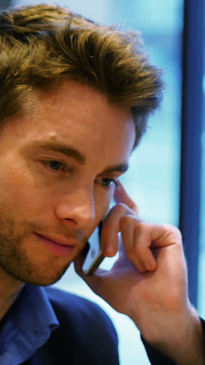 Businessman talking on mobile phone