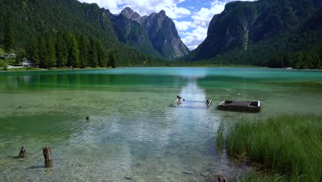 lake dobbiaco in the dolomites, italy