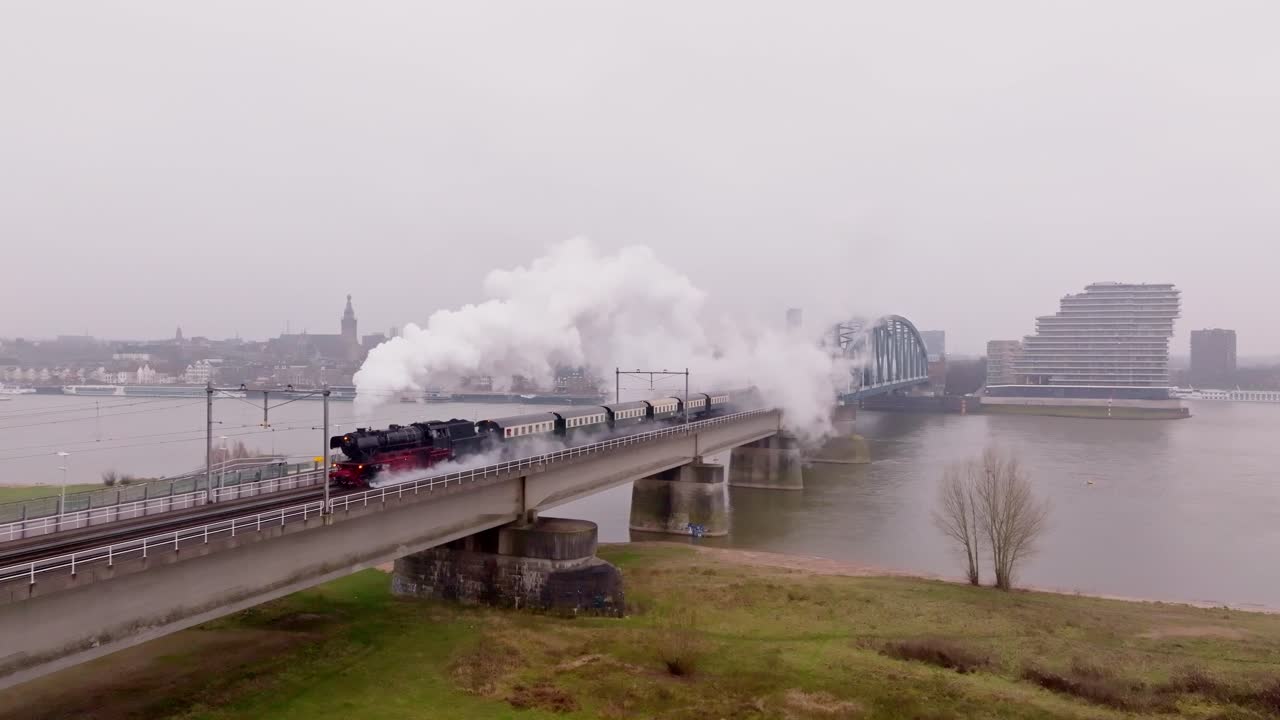 Steam Train in Motion Toward Nijmegen – Aerial Perspective