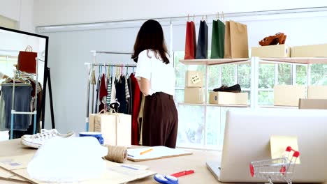young asian woman with startup small business entrepreneur freelance working at home