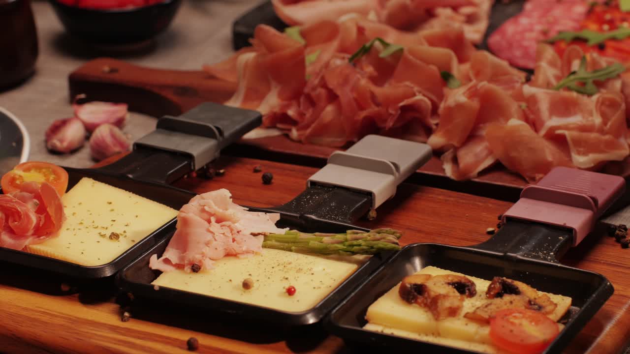 Italian or Spanish restaurant with traditional tapas food, Spanish cuisine, delicious tapas and cheese plate, bruschetta with cheese, olives dry tomatoes and tasty sandwich bar appetizer, buffet