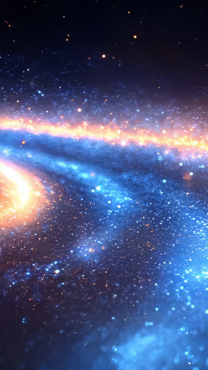 A bright blue and orange galaxy with a spiral shape. The colors are vibrant and the stars are twinkling