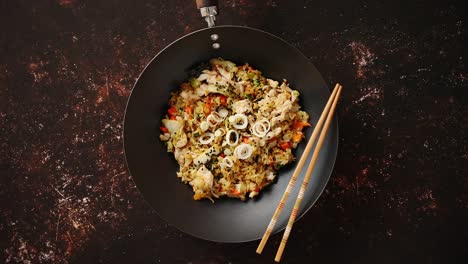 delicious fried rice with chicken in wok