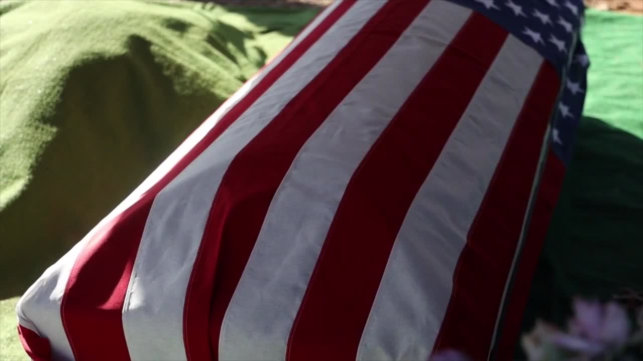 American Flag Draped Over a Casket