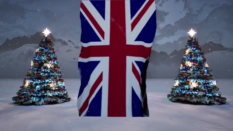 merry christmas from the uk! a snowy winter wonderland with christmas trees and the union jack flag.