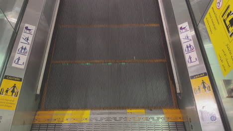 escalator safety signs