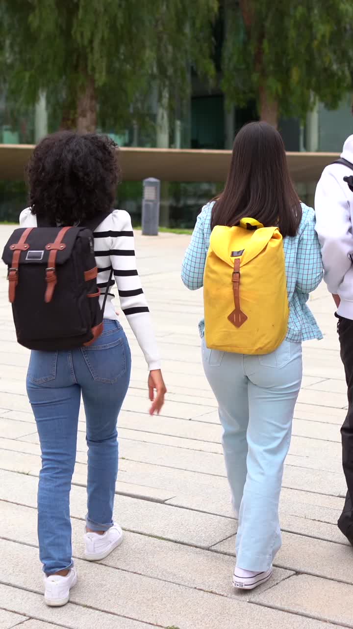 Students walking with backpacks
