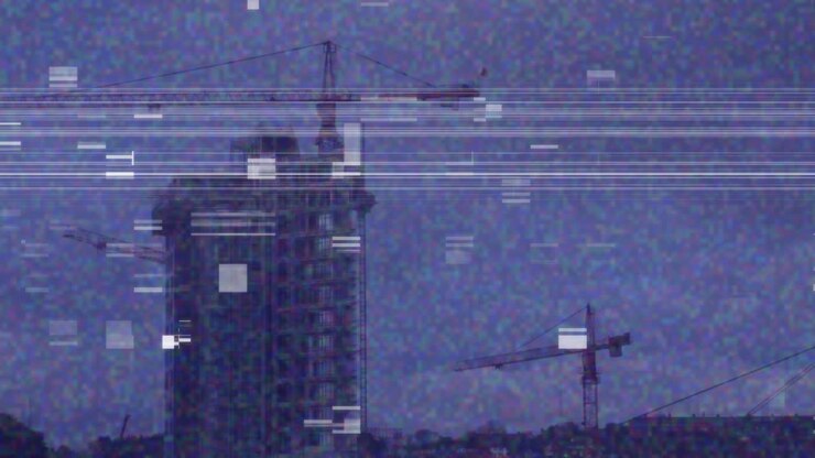 Cranes and modern buildings