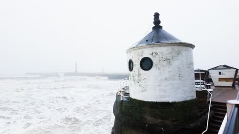 very mist and foggy scene on the coast of the uk