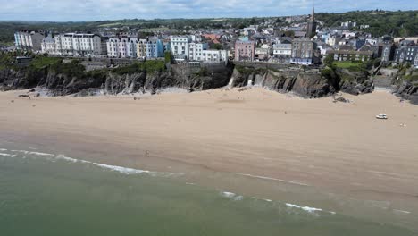 Tenby-south-beach-Seaside-town-in-Pembrokeshire,-Wales,-Aerial-4K-footage