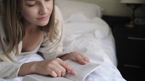 woman reading in bed