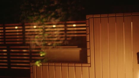 Woman-entering-cozy-sauna-during-winter-in-wellness-hotel