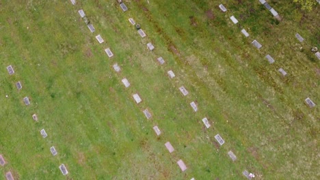 cemetery graveyard drone aerial footage grand rapids michigan with green foliage and trees and gravestones